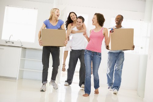 Removal team preparing household items for a move in South Kensington