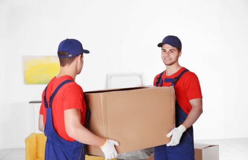 Household items being loaded into a van for a South Kensington move
