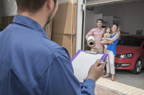 Movers using protective equipment during a South Kensington relocation