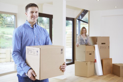 Packed office equipment ready for transport during a local relocation