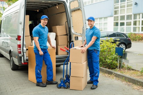 Relocation crew handling office items during a London move