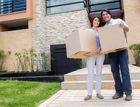 Packed boxes and wrapped furniture ready for house removals
